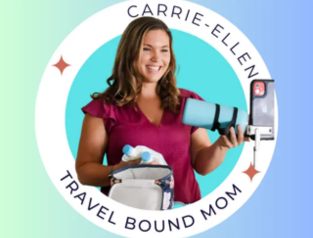 woman holding blue bottle and smiling 