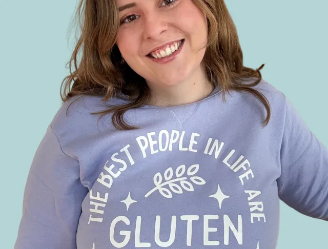 Alla wearing a shirt that says "the best people in life are gluten free"
