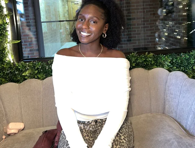 A picture of Asi smiling