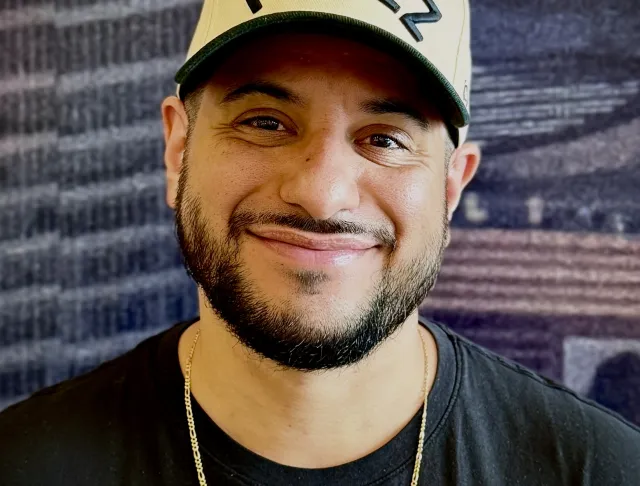 Photo of PEREZ with PEREZ hat